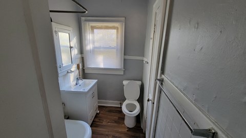 a small bathroom with a toilet and a sink