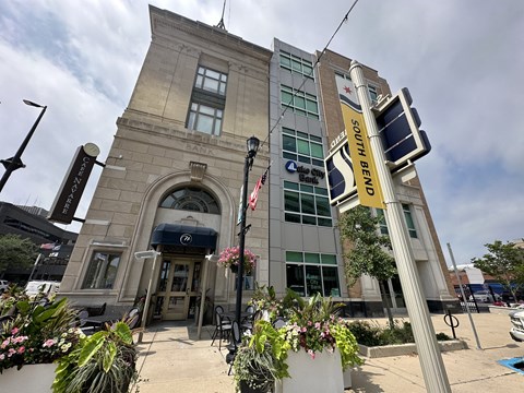 a building with a traffic light in front of it