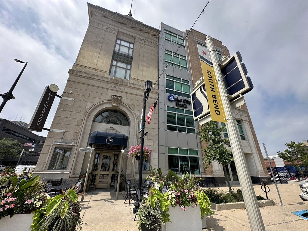 a building with a traffic light in front of it