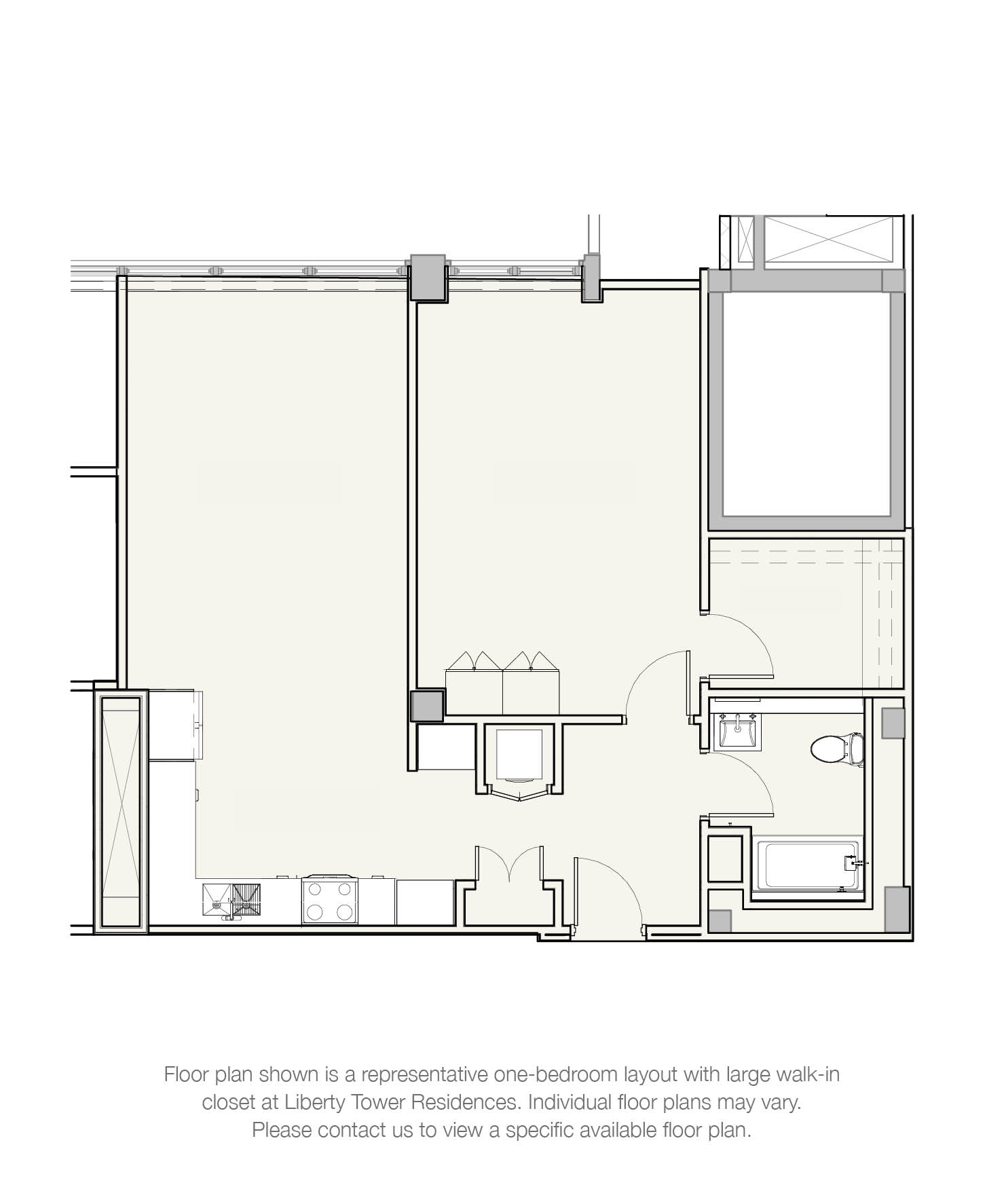 A floor plan of a one-bedroom apartment with a large walk-in closet at Liberty Tower Residences.