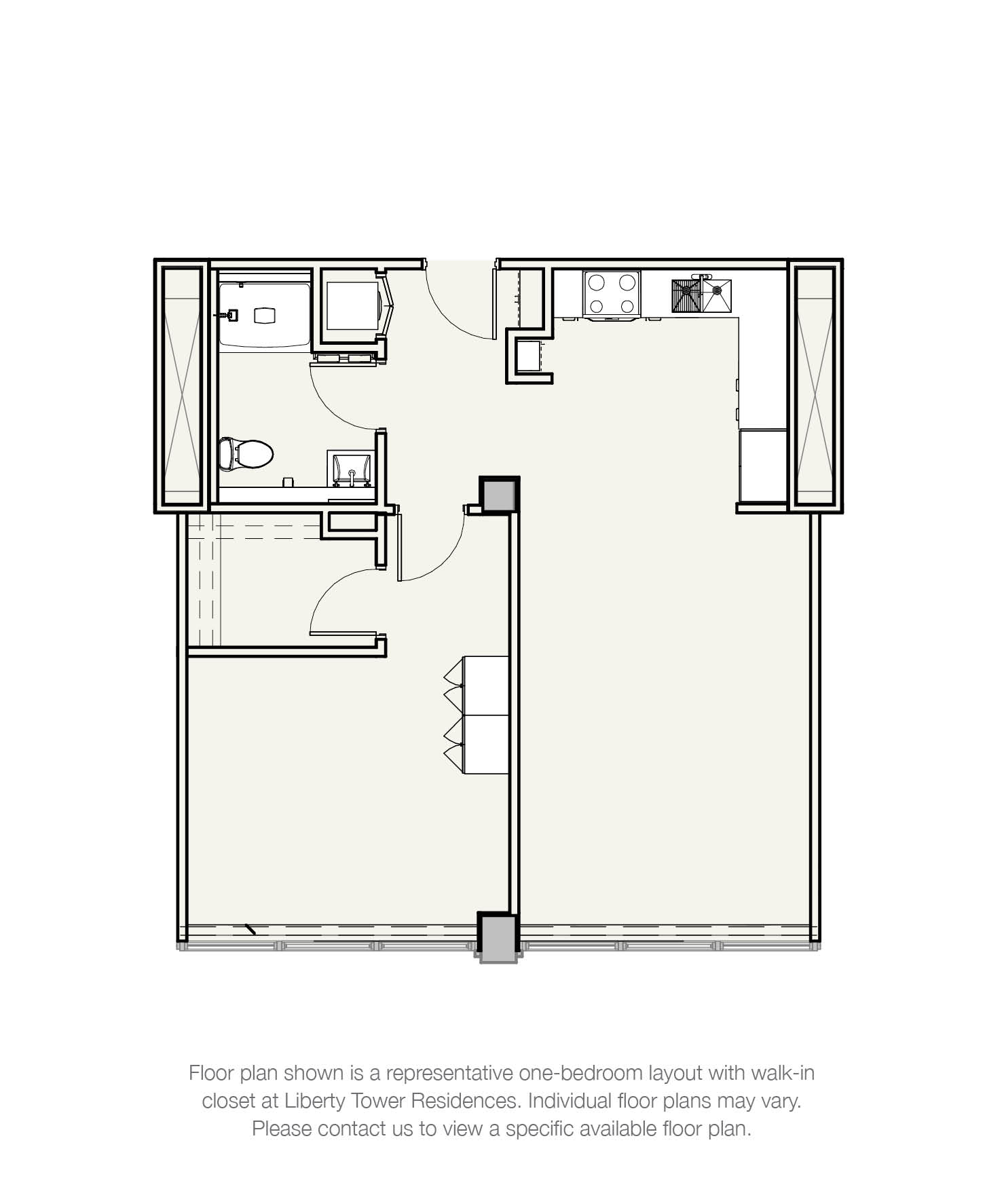 A floor plan of a one-bedroom apartment with a walk-in closet at Liberty Tower Residences.