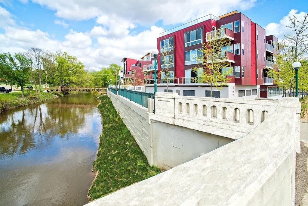 a view of a river with a building in the background