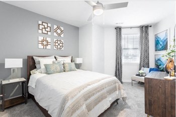 Bedroom With Expansive Windows Bedroom With Expansive Windows at River Point West Apartments, Indiana, 46516 - Photo Gallery 5