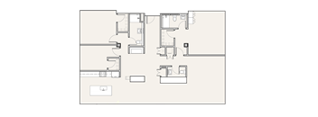 A floor plan of a building with multiple rooms and corridors.