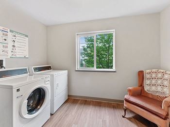 Laundry room at Lakewood Meadows in Lakewood, WA