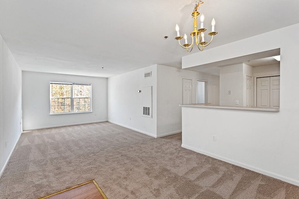 Living and dining area at England Run Apartments in Fredericksburg VA