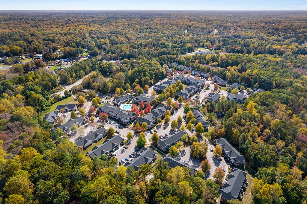 Aerial view of apartments and neighborhood at Grand Oaks in Chester VA