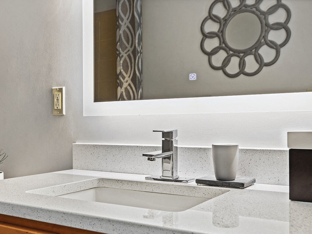 Bathroom vanity at Axis Admirals Hill Apartments in Chelsea MA