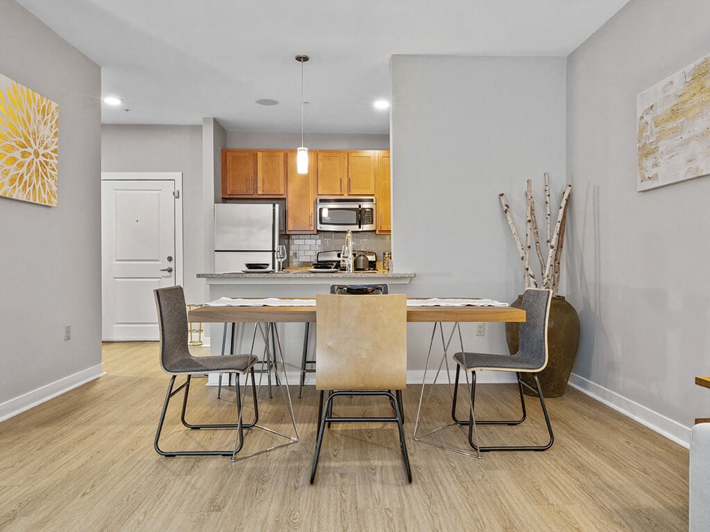 Dining area at Axis Admirals Hill Apartments in Chelsea MA