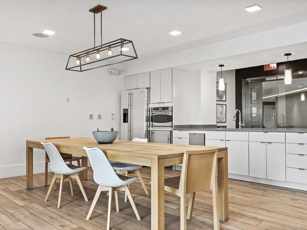 Common kitchen at Axis Admirals Hill Apartments in Chelsea MA