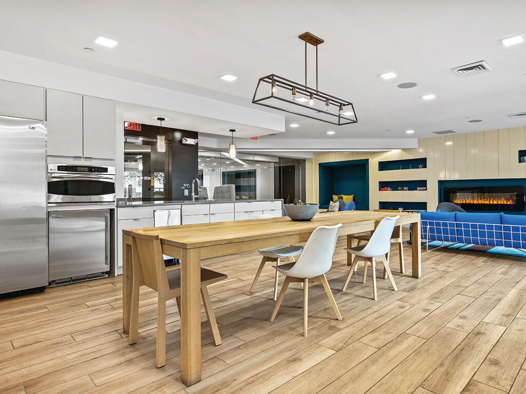 Common area kitchen at Axis Admirals Hill Apartments in Chelsea MA