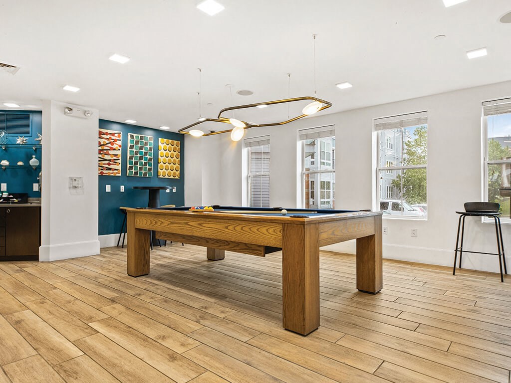 Game room at Axis Admirals Hill Apartments in Chelsea MA