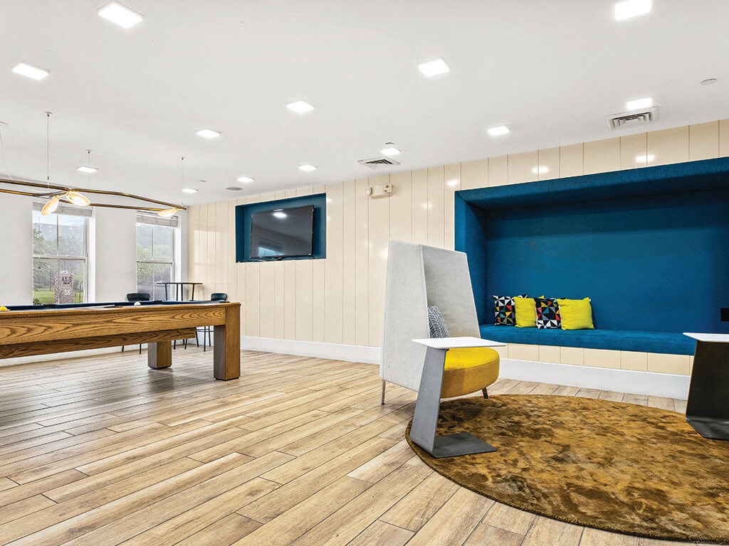 Game area at Axis Admirals Hill Apartments in Chelsea MA