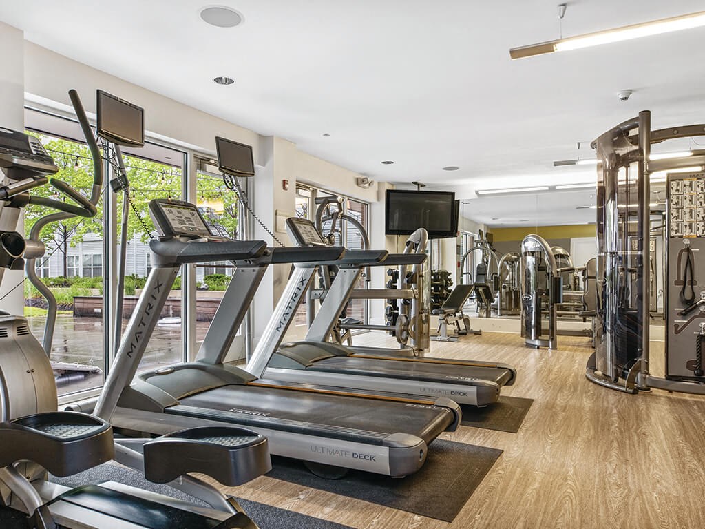 Gym at Axis Admirals Hill Apartments in Chelsea MA