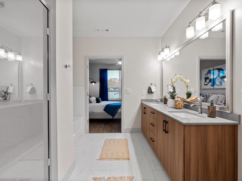 Bathroom attached to bedroom at VERO Apartments in Chelsea MA