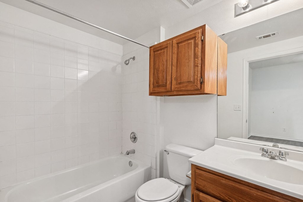 Bathroom with ample storage at Cypress View Villa Apartments in Weatherford TX