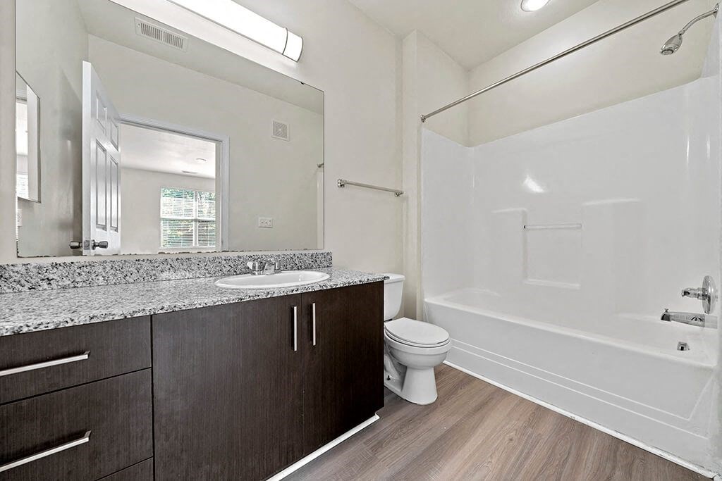 Bathroom with sink and shower tub at Grand Oaks in Chester VA