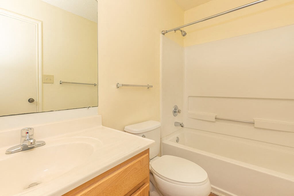 Bathroom with shower tub at Greens of Pine Glen in Durham NC