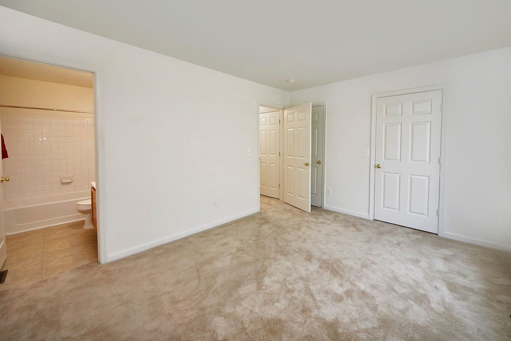 Bedroom with attached bathroom at Broadwater Townhomes in Chester, VA