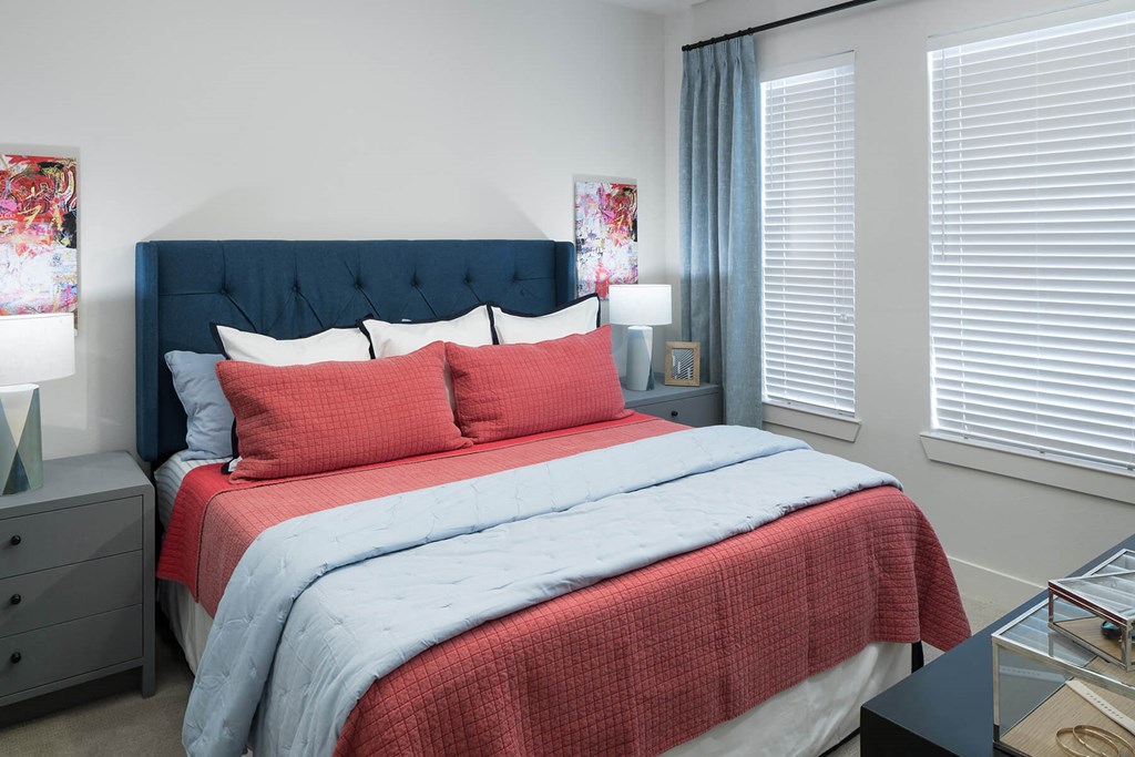 Bedroom with natural lighting at Jada Legacy Central Apartments in Plano TX