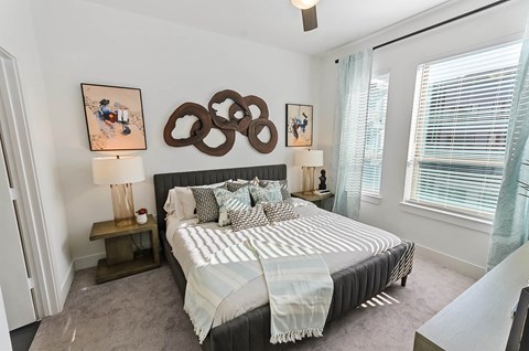 Bedroom with carpet at Opal Legacy Central in Plano TX