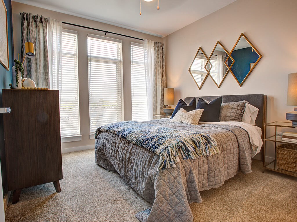 Bedroom with large window at Caroline Charleston SC