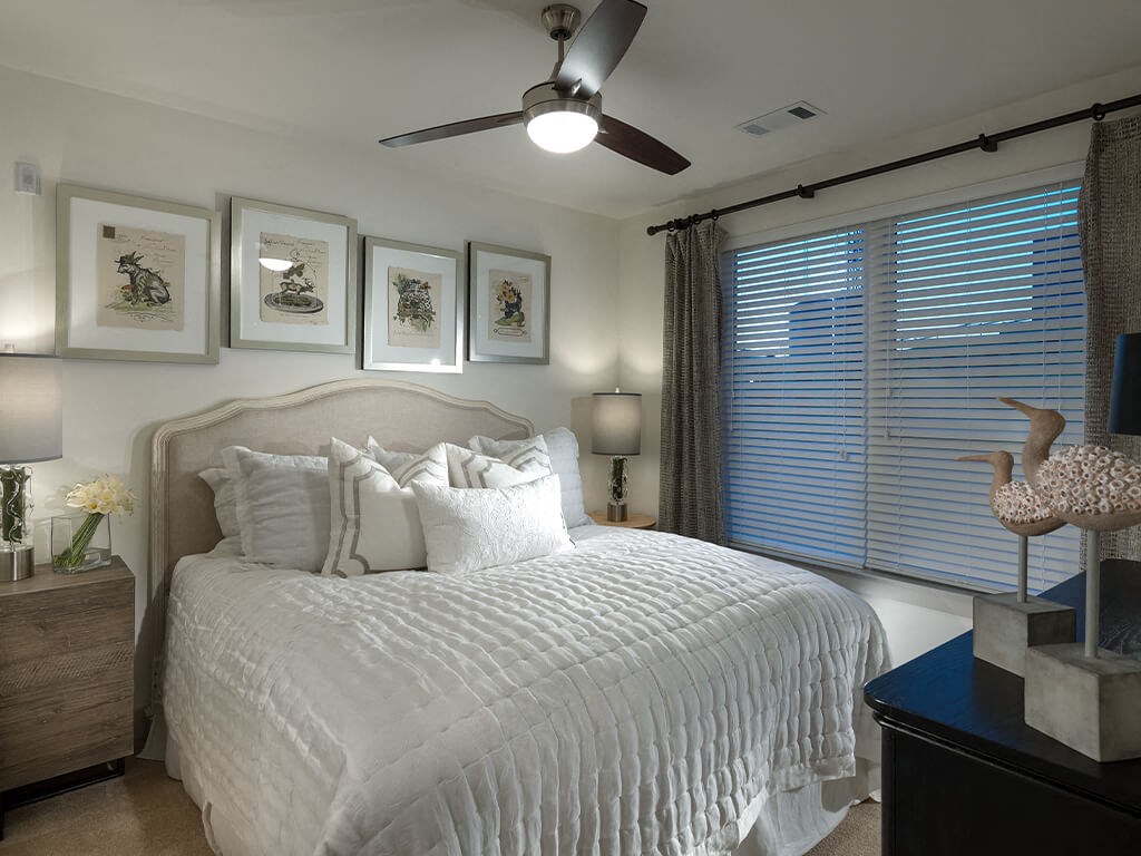 Bedroom with large window at Cirro King of Prussia Apartments in King of Prussia PA