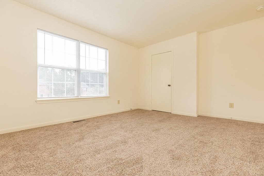 Carpeted bedroom at Greens of Pine Glen in Durham NC