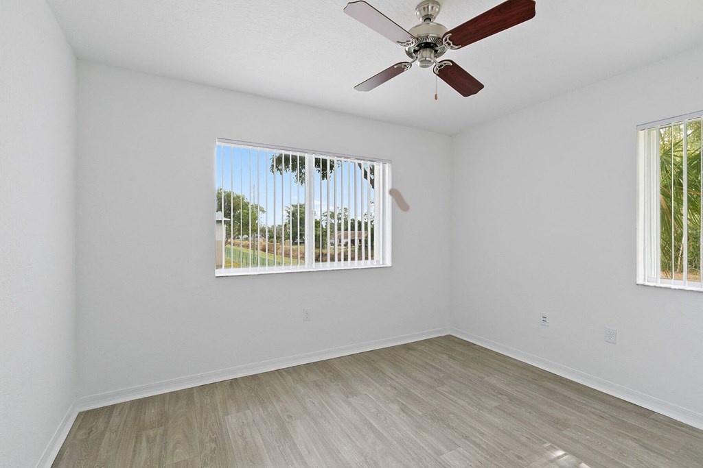 Bedroom with ceiling fan at Brenton at Abbey Park Apartments in West Palm Beach FL