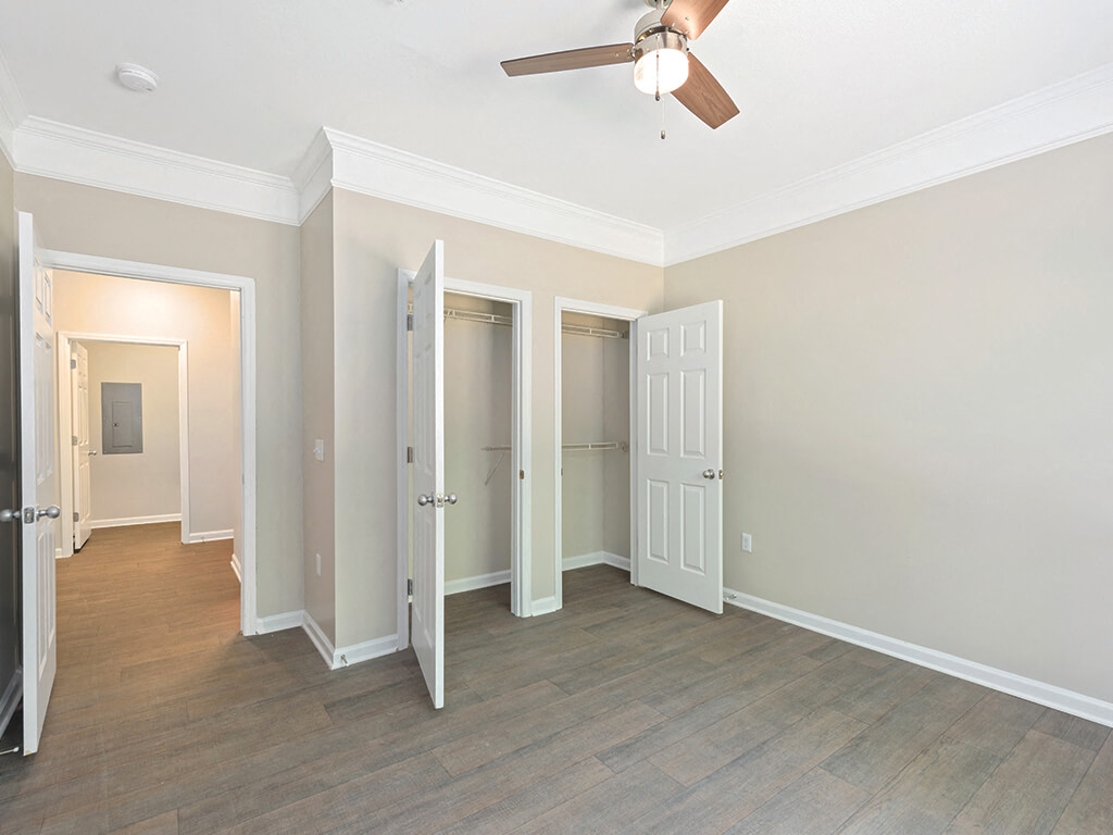 Bedroom with closet space at Falls Pointe Apartments in Durham NC