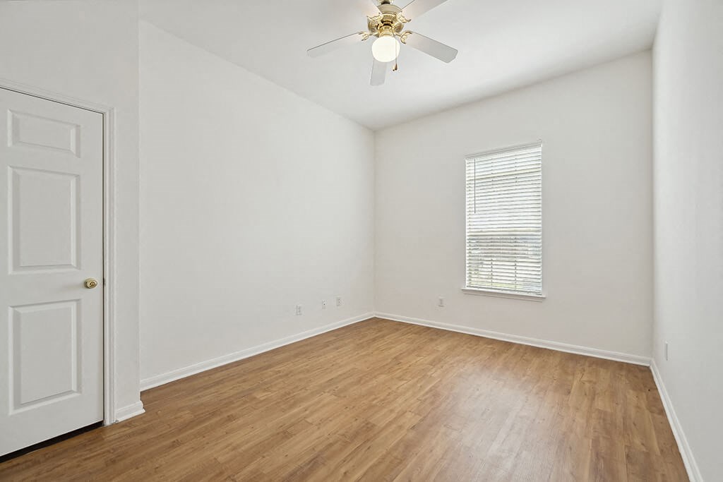 Bedroom with window at Fallbrook Ranch in Houston TX