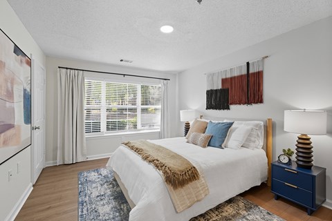Primary bedroom at Chroma Park Apartments in Austell GA
