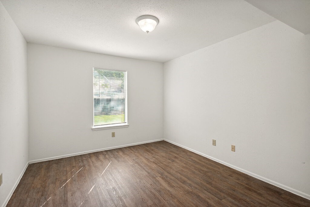 Bedroom at Dayton Park Apartments in Dayton, TX