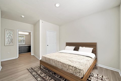 Bedroom with attached bathroom at Grand Oaks Apartments in Chester VA