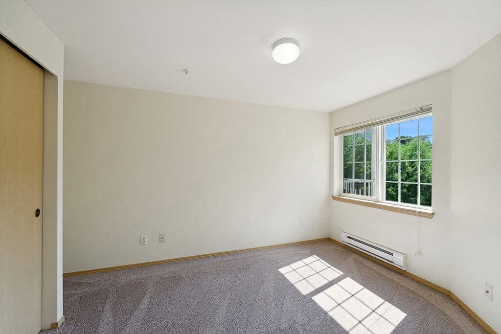 Bedroom at Woodlands at Forbes Lake Apartments in Kirkland WA