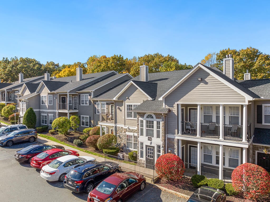 Building Exterior and Parking Lot at River Point at Den Rock Park in Lawrence MA