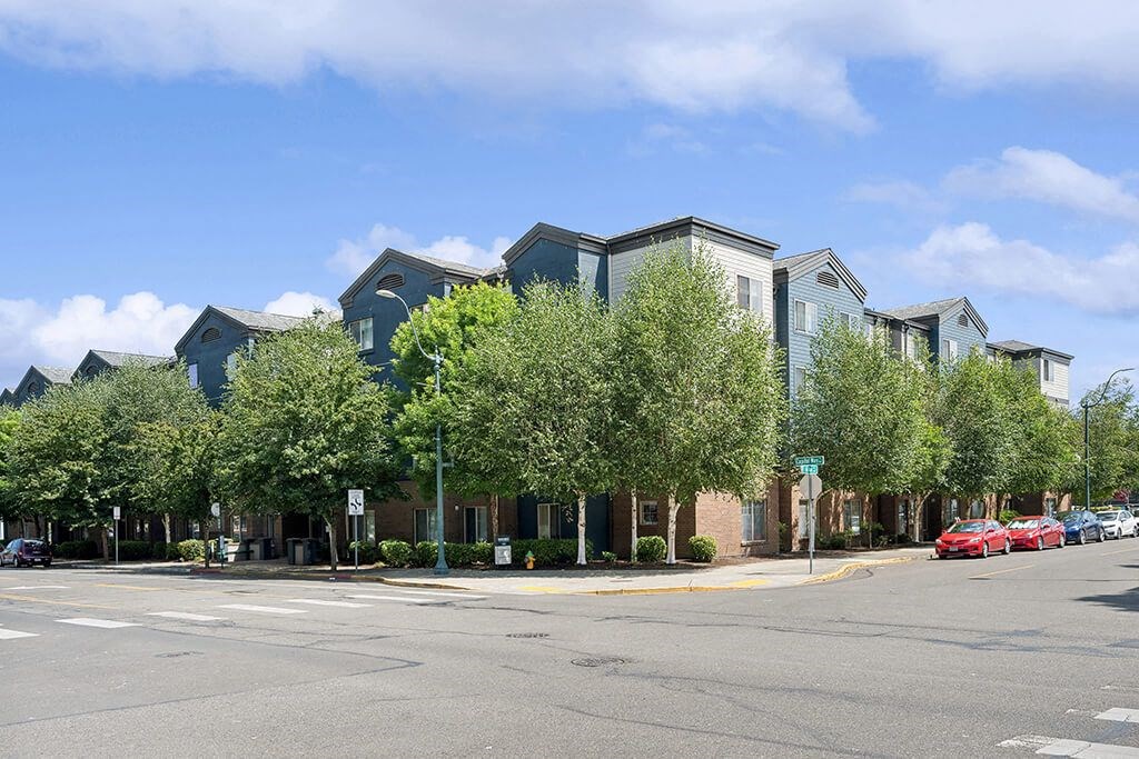 Building exterior with trees at Boardwalk in Olympia WA