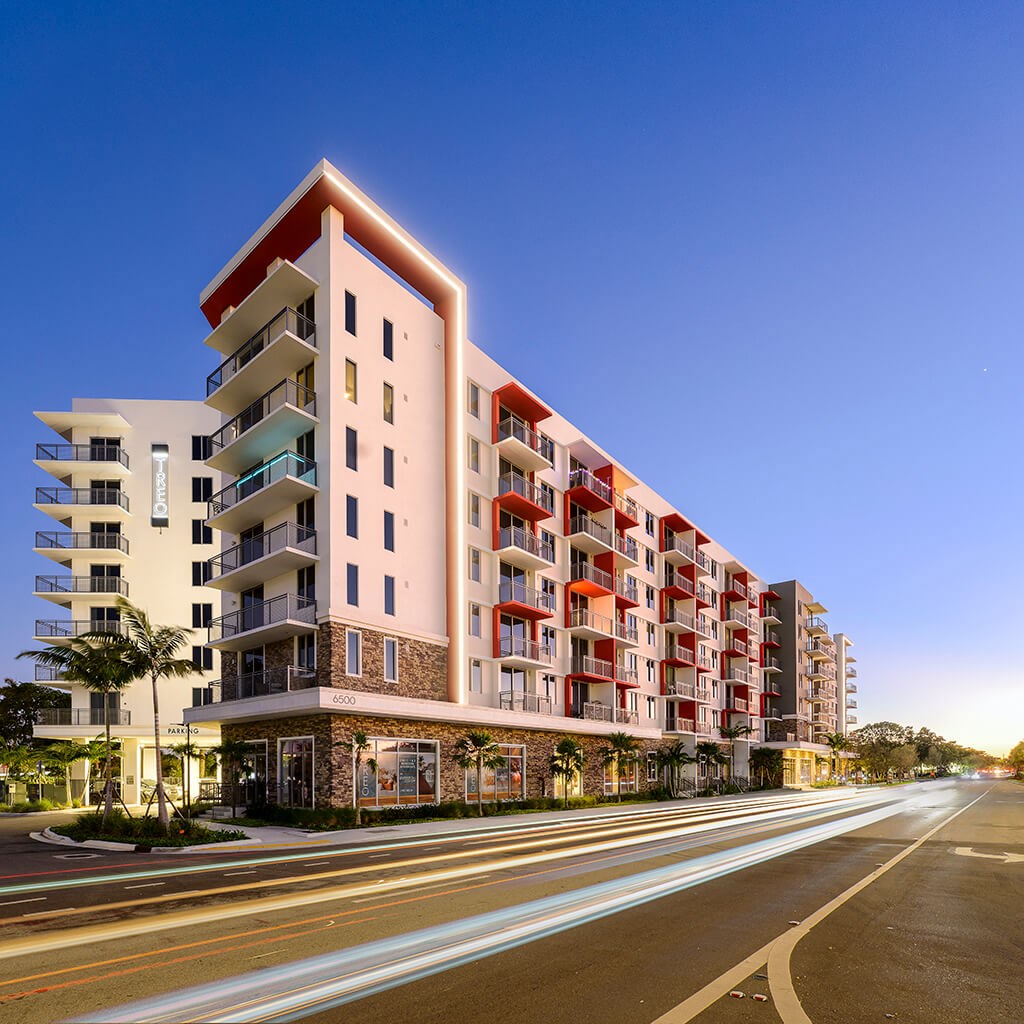 Exterior building at dusk at Treo Apartments in Fort Lauderdale FL