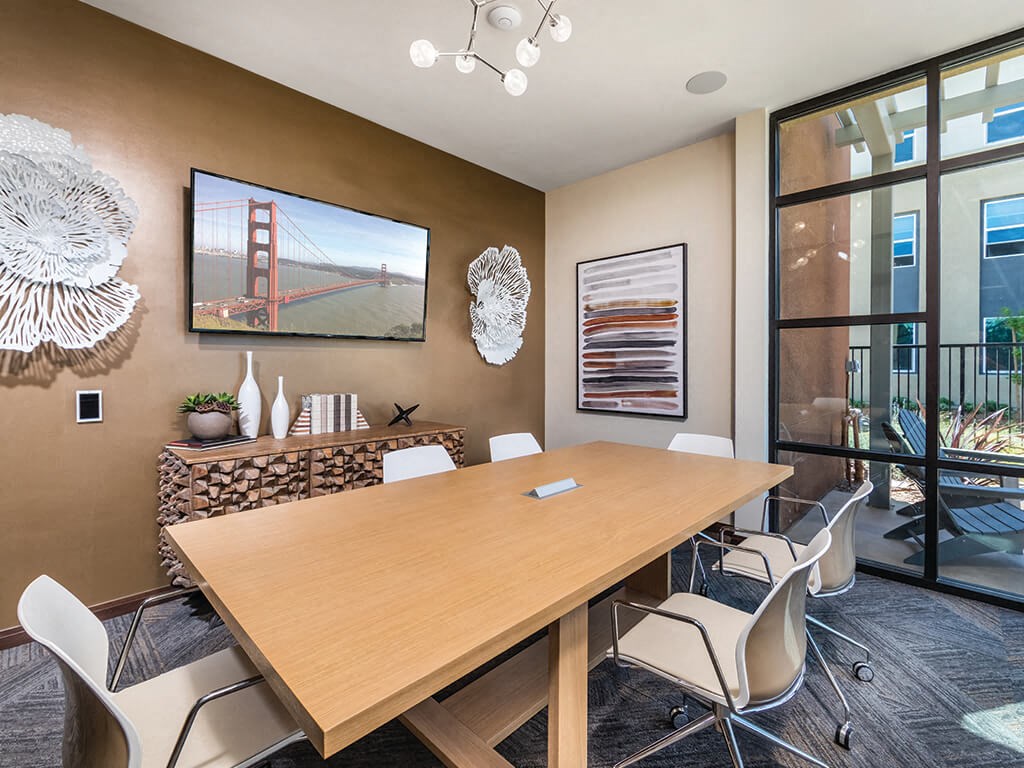 a conference room with a view of the golden gate bridge