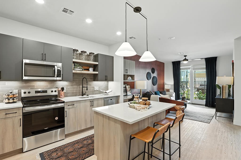 Charcoal design kitchen at Station 316 Apartments in Woburn MA