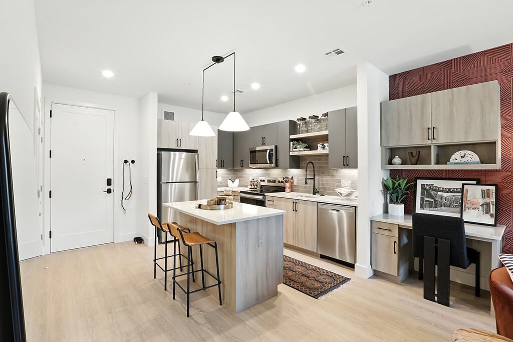 Charcoal design kitchen at Station 316 Apartments in Woburn MA