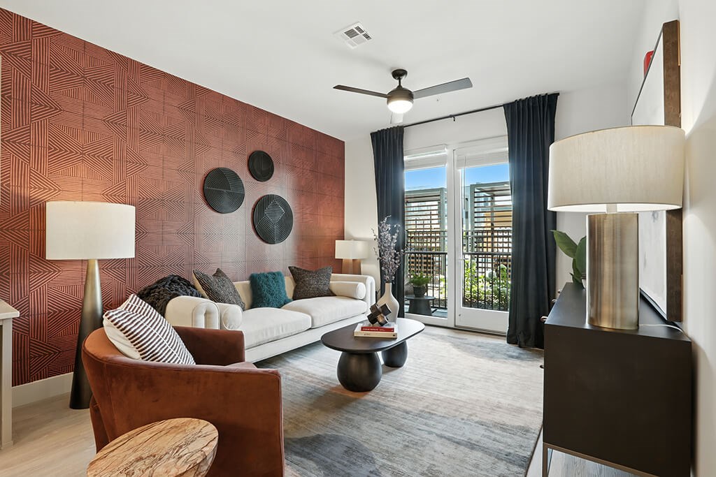 Charcoal design living room at Station 316 Apartments in Woburn MA