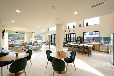 Club room seating area and billiards at Verge Apartments in Atlanta, GA