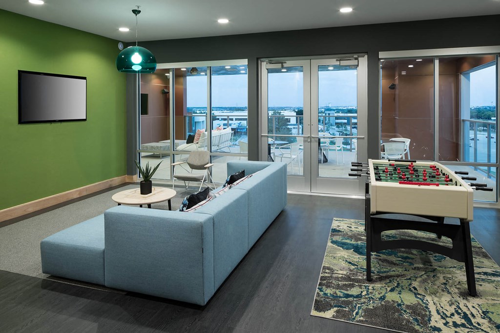 Clubhouse couch at Jada Legacy Central Apartments in Plano TX