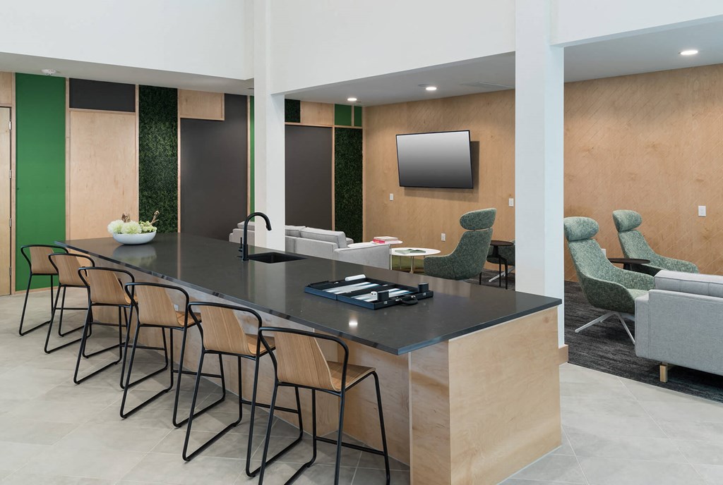 Clubhouse island seating at Jada Legacy Central Apartments in Plano TX