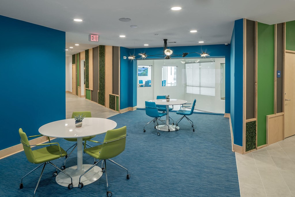 Clubhouse tables at Jada Legacy Central Apartments in Plano TX.