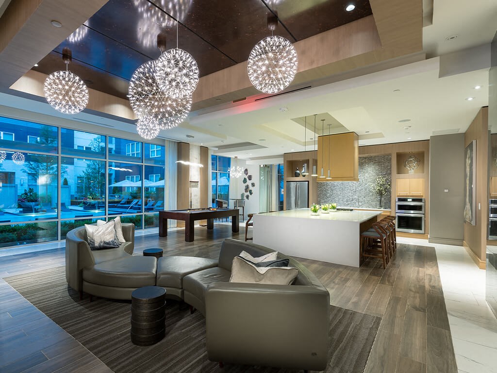 Clubroom seating area with chic lighting at Cirro King of Prussia Apartments in King of Prussia PA