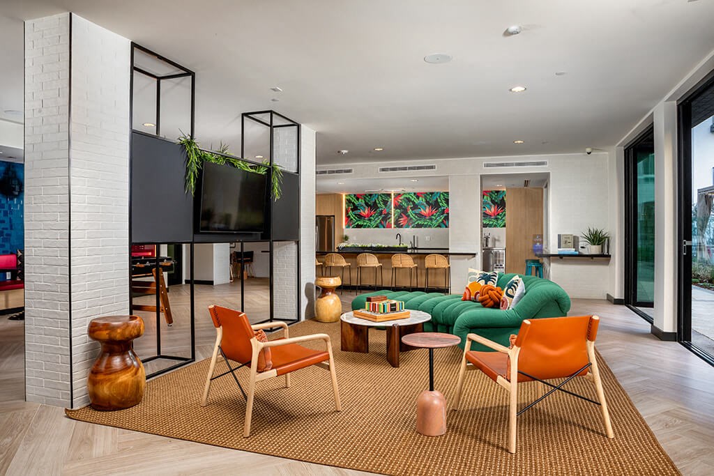 Clubroom Jive Seating Area and Kitchen at Chroma Apartment Homes in Canoga Park CA
