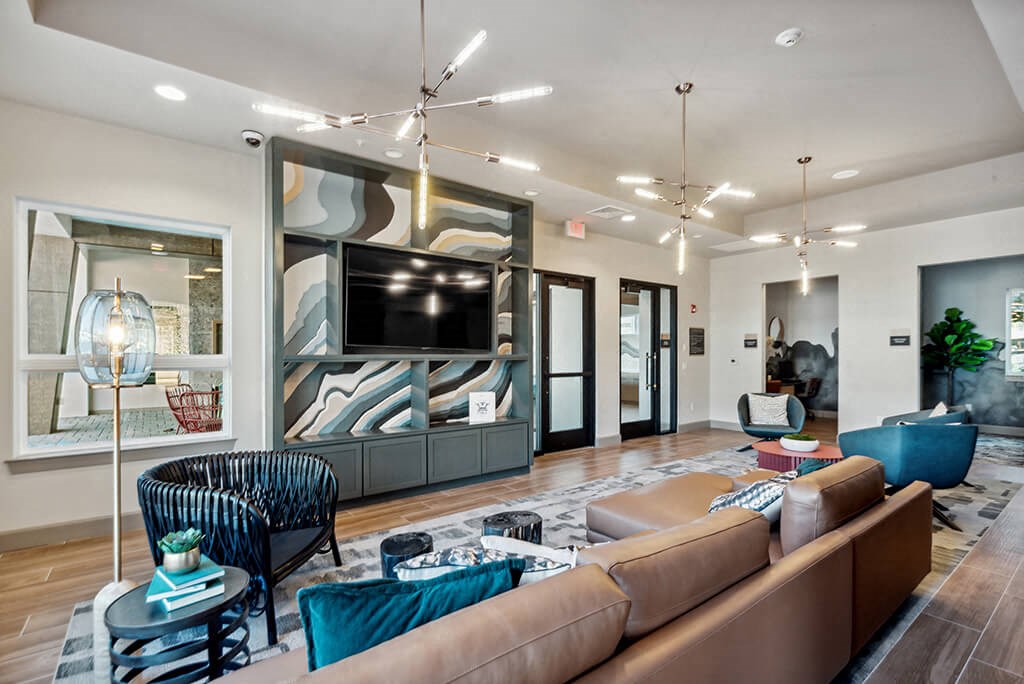 Clubroom TVs at The Quill Apartments in Milford, MA