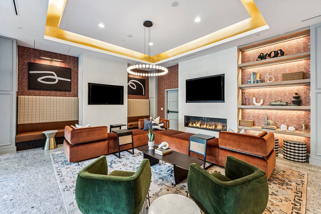 Clubroom with two TVs at 333 Ellington Apartments in Gaithersburg MD